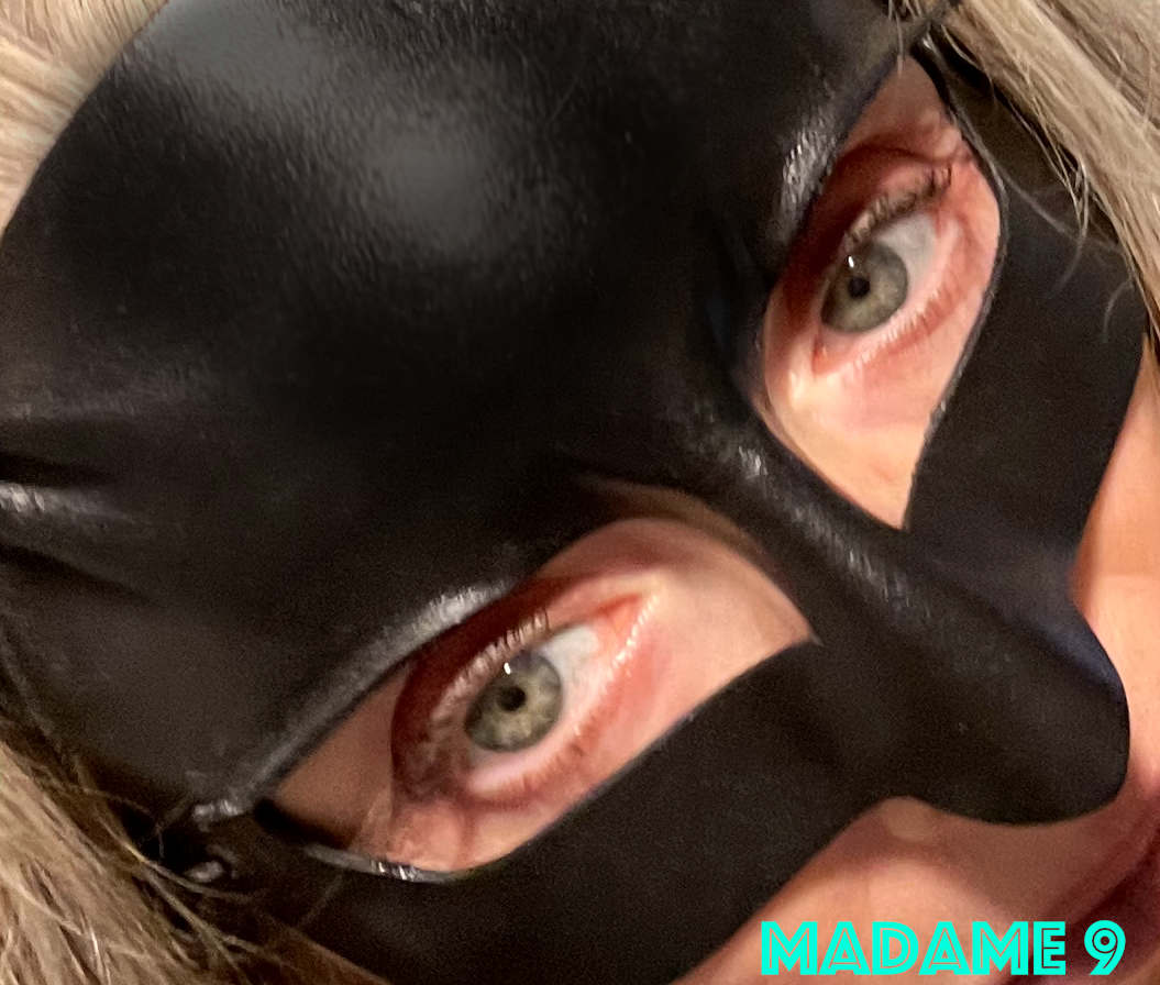 Madame 9 in Her Mask